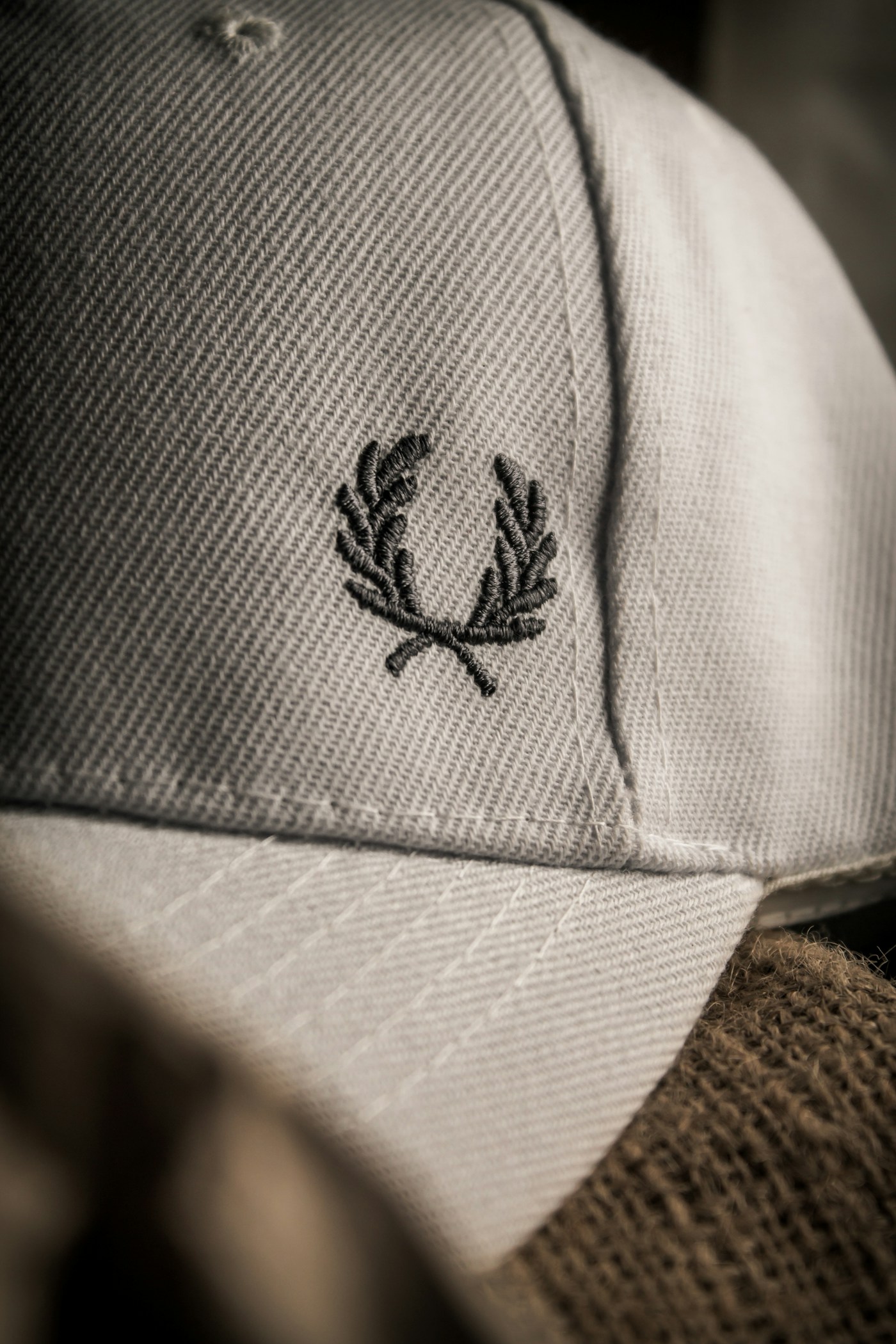 Close-up embroidered cap showing detailed stitching